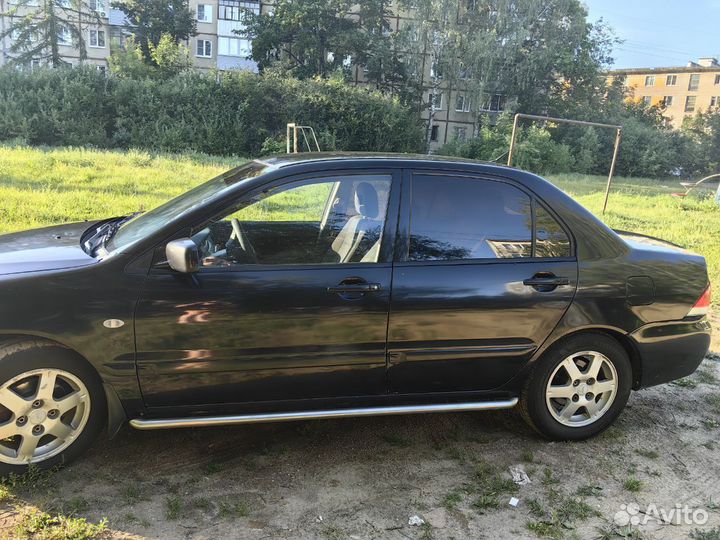 Mitsubishi Lancer 1.6 МТ, 2006, 260 000 км