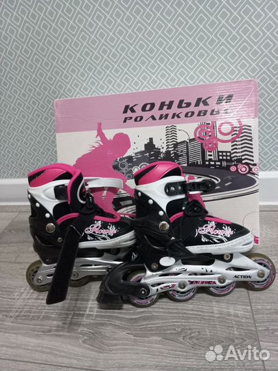 Роликовые коньки