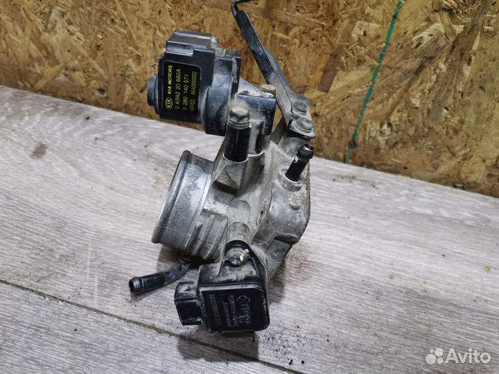 Дроссельная заслонка Kia Spectra