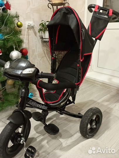 Трехколесный велосипед с ручкой