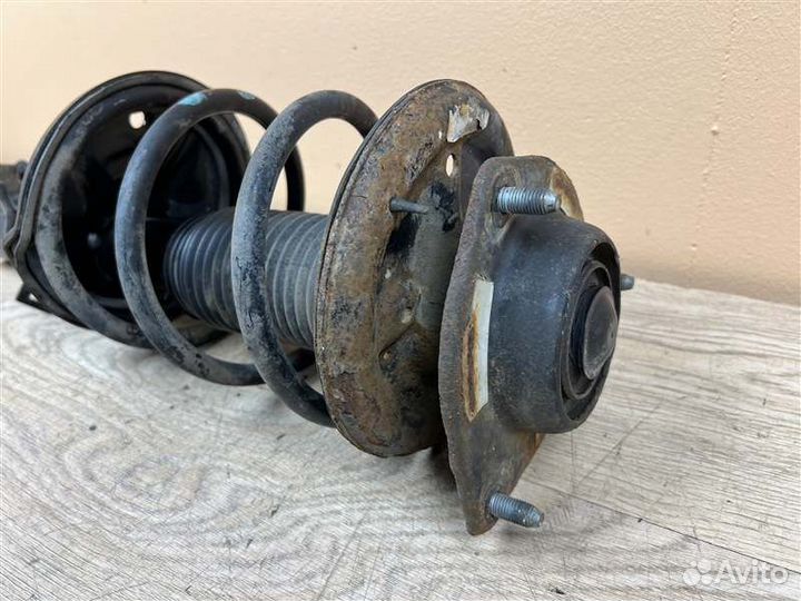 Амортизатор передний левый Kia Cerato 1 1.6 АКПП