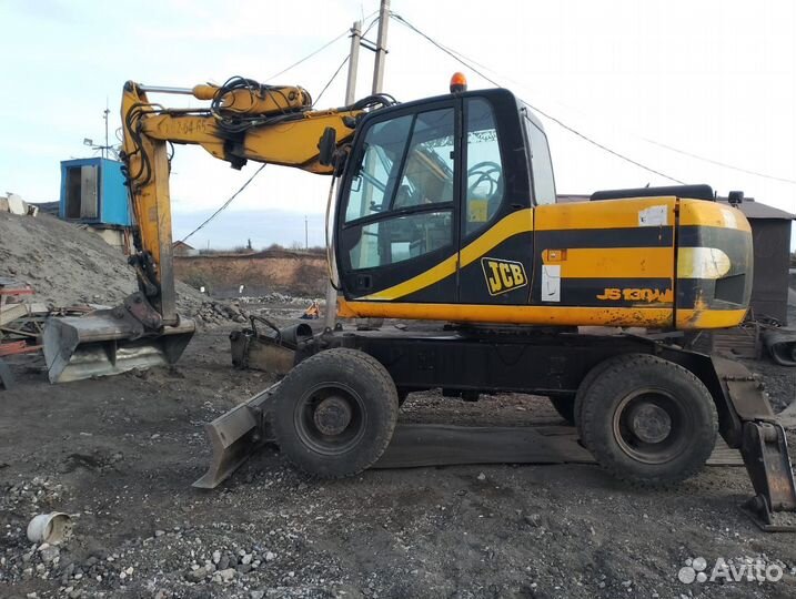 Колёсный экскаватор JCB JS 130W, 2000