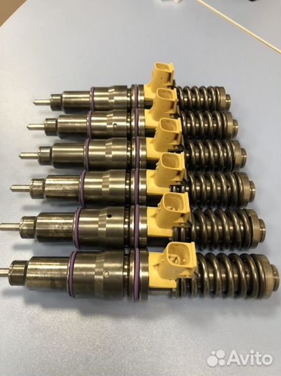 Насос форсунки Volvo FH12 21340611