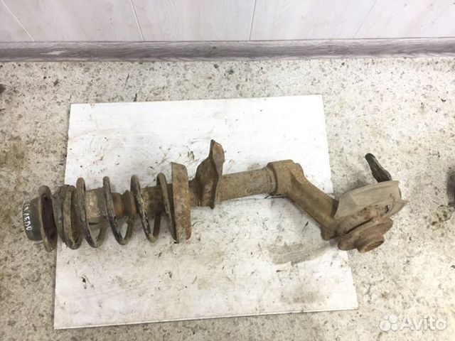 Стойка передняя левая Daewoo Nexia седан A15MF