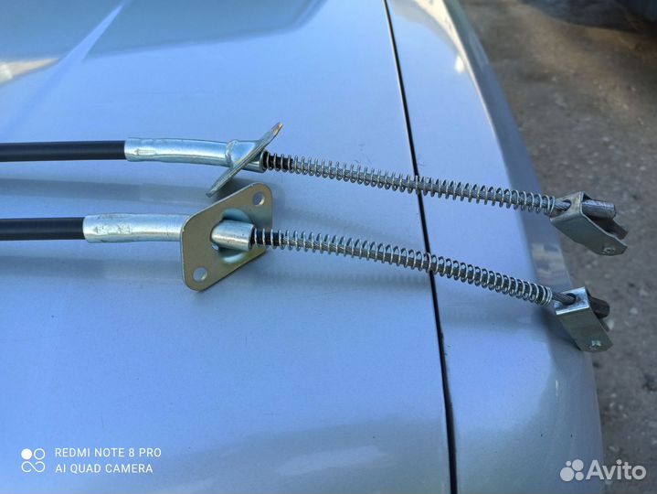 Трос привода стояночного тормоза