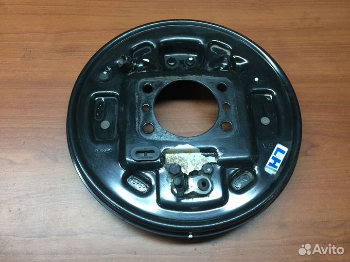 Щит опорный задний левый KIA RIO 58300-H5200