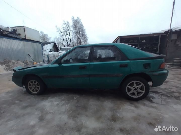 В разбор Мазда 323 F