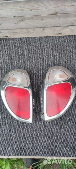 Фонарь задний Daihatsu Storia EJ 2000