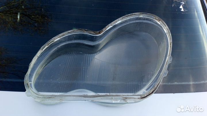 Стекло фары правой Mercedes-Benz W203