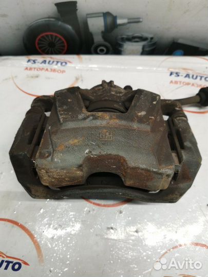 Суппорт тормозной передний левый Opel Astra J