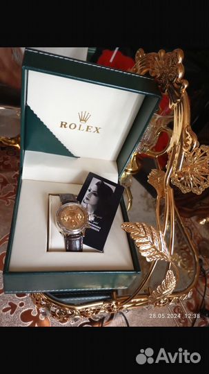 Золотые часы rolex 585
