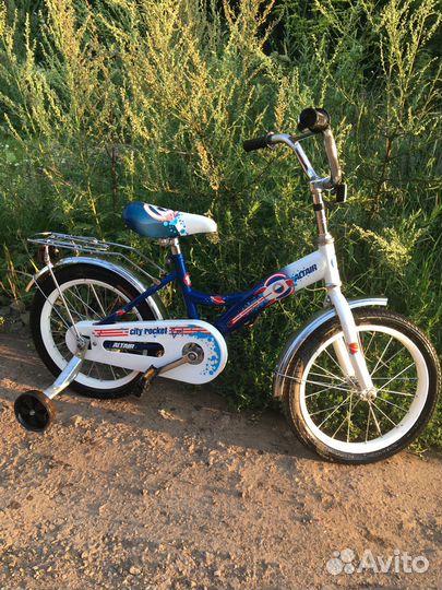Детский четырёх колёсный велосипед