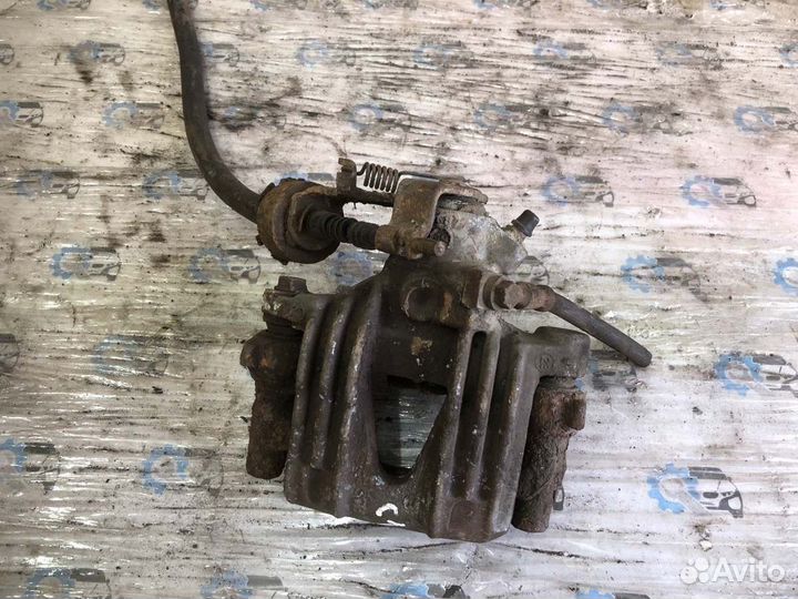 Суппорт передний правый Opel Astra G универсал