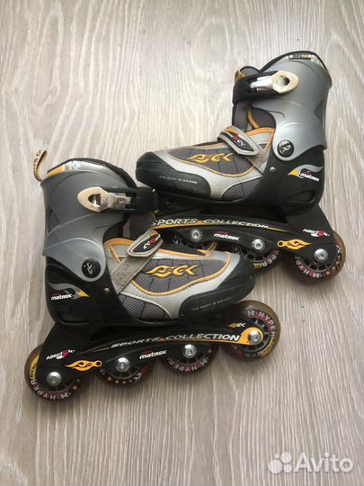 Роликовые коньки