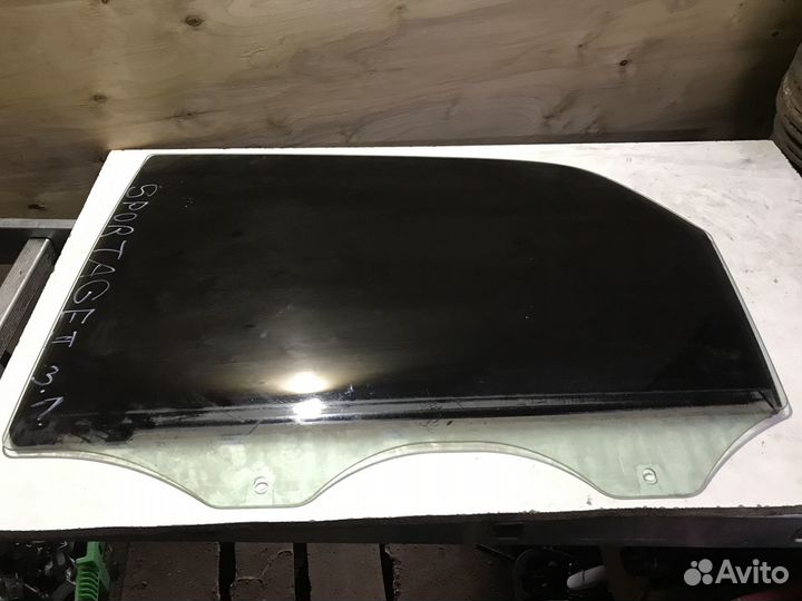 Стекло заднее левое Kia Sportage 2