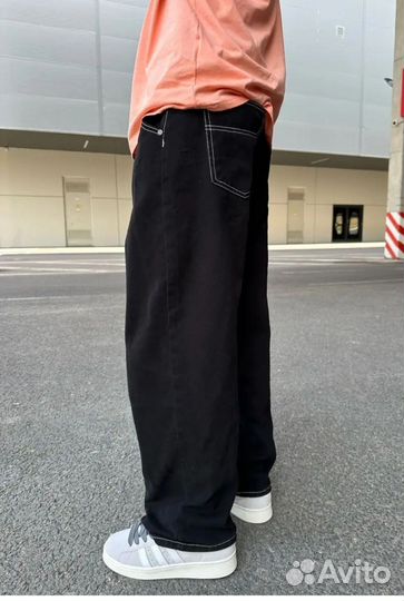 Джинсы широкие