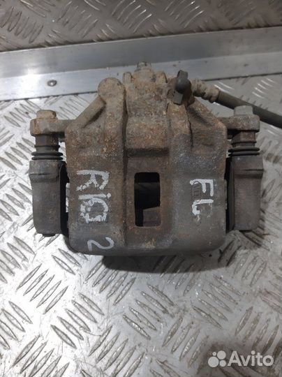 Суппорт передний левый Kia Rio JB