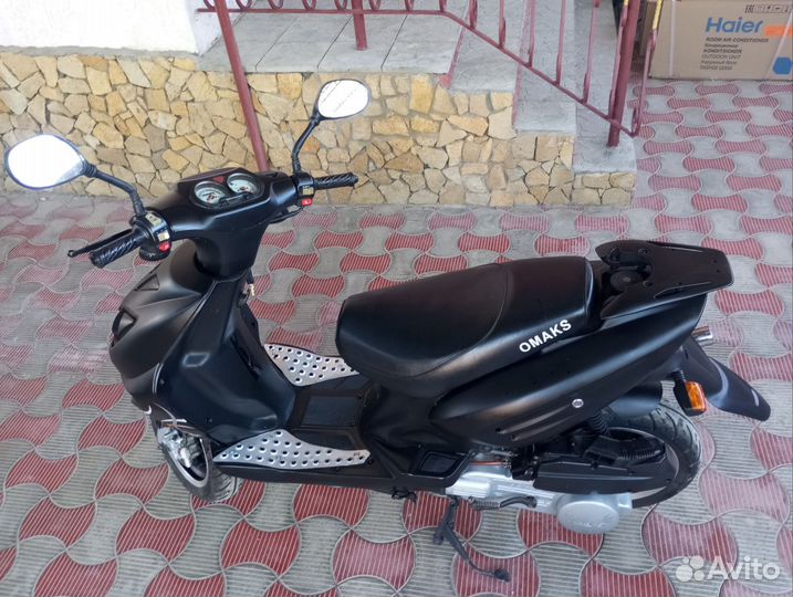 Скутер омакс