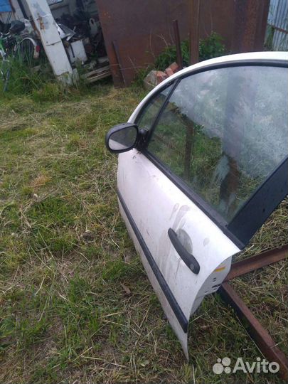 Дверь Ситроен c3 передняя левая