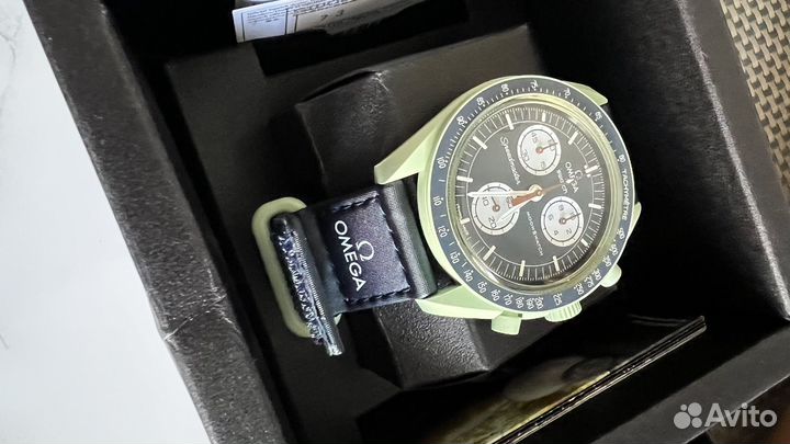 Часы swatch omega earth