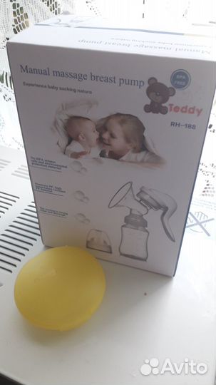 Молокоотсос и накладки на грудь medela