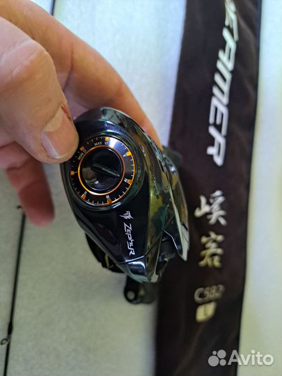 Кастинговый спиннинг с катушкой