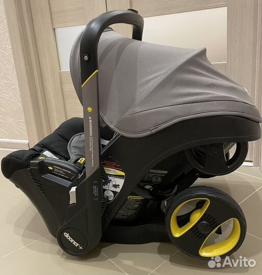 Коляска автокресло doona с базой isofix