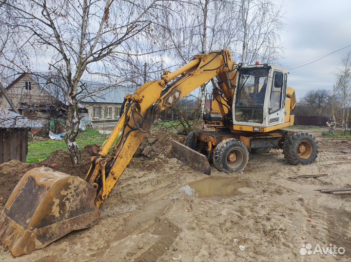Услуги колёсного экскаватора