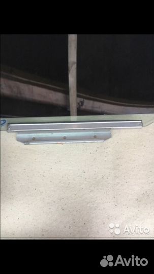 Стекло задней двери Toyota Corolla 120