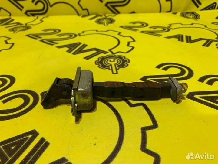 Ограничитель двери задний левый Nissan Primera