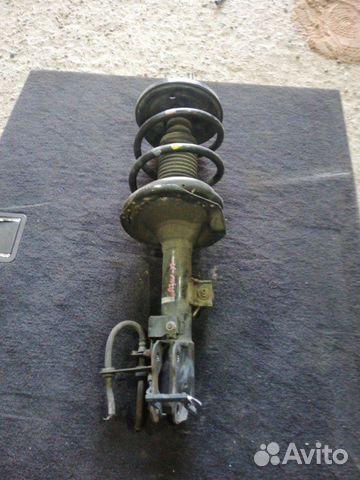 Стойка амортизатора передняя левая Mitsubishi Asx