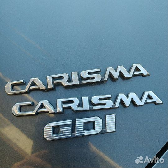 Шильдики Carisma GDI