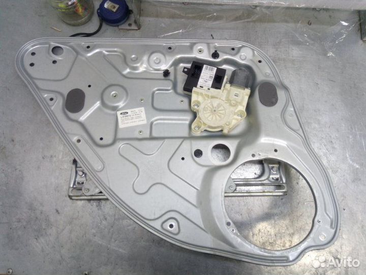 Стеклоподъемник задний левый Ford Focus 2
