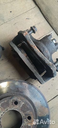 Суппорт лансер 10 передний