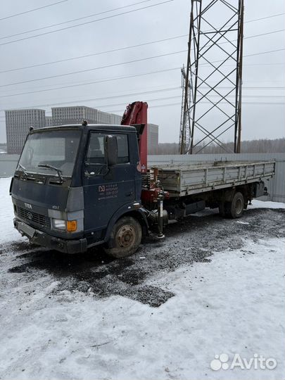 Бортовой грузовик TATA 613 с КМУ AMCO VEBA, 2010