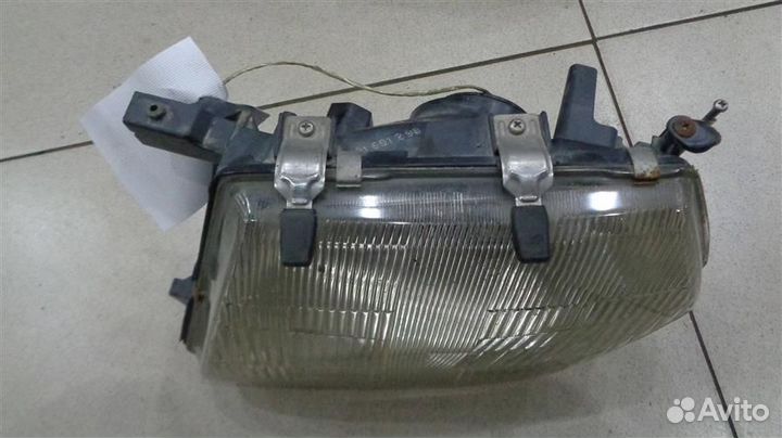 Фара левая Nissan Patrol Y61 1997-2010