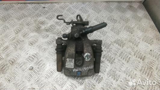 Суппорт тормозной задний левый skoda octavia A7 (H