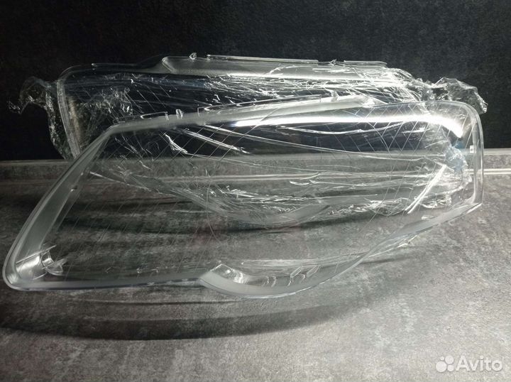 Стекло фары passat b6