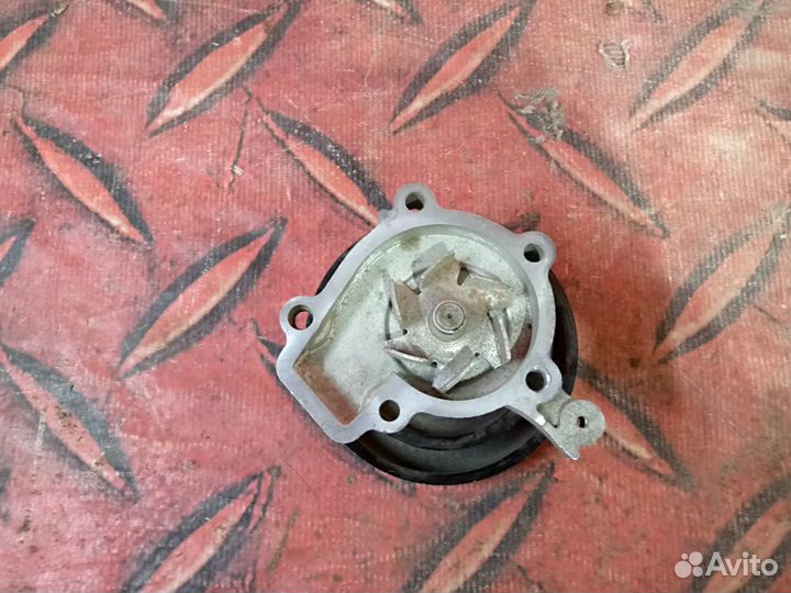 Насос водяной Hyundai Tucson 1