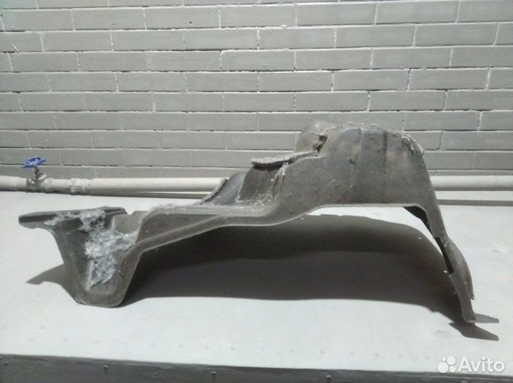 Обшивка багажника задняя левая Toyota Corolla 120