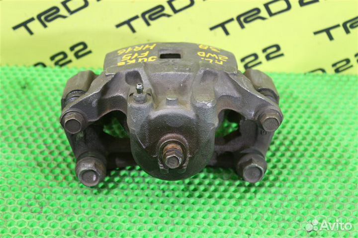 Суппорт тормозной передний левый Nissan Juke F15