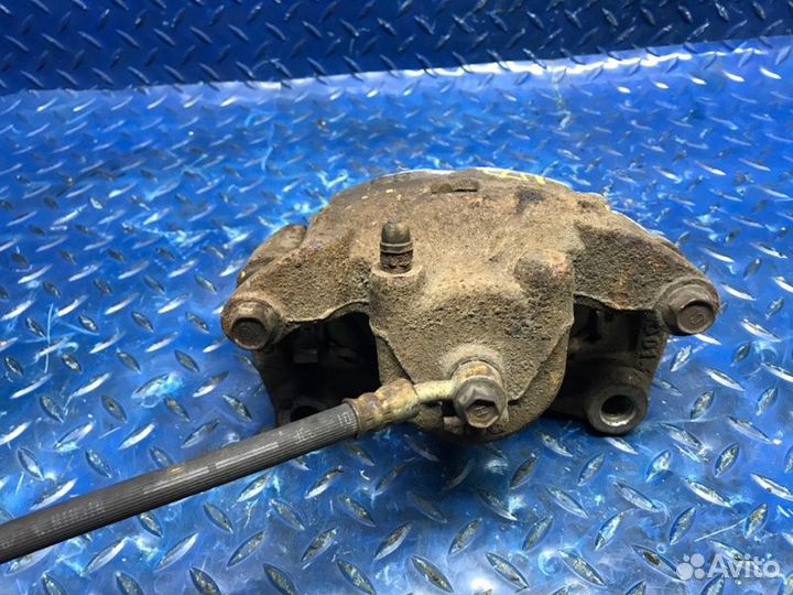 Тормозной суппорт передний левый Nissan Juke