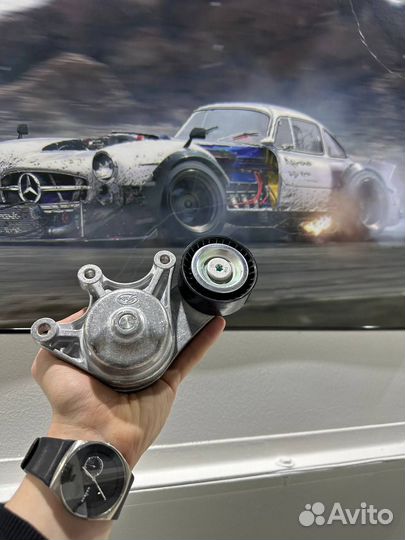 Натяжитель ремня BMW 11287594969