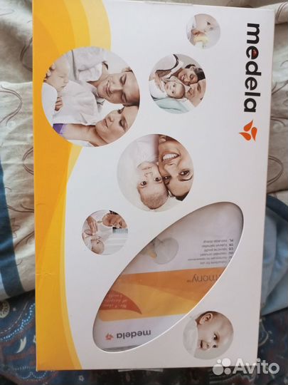 Молокоотсос medela