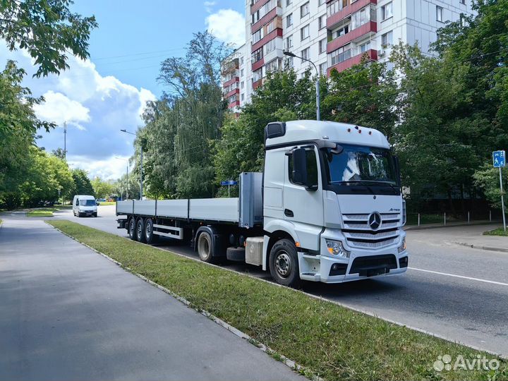 Водитель категории Е на бортовой полуприцеп