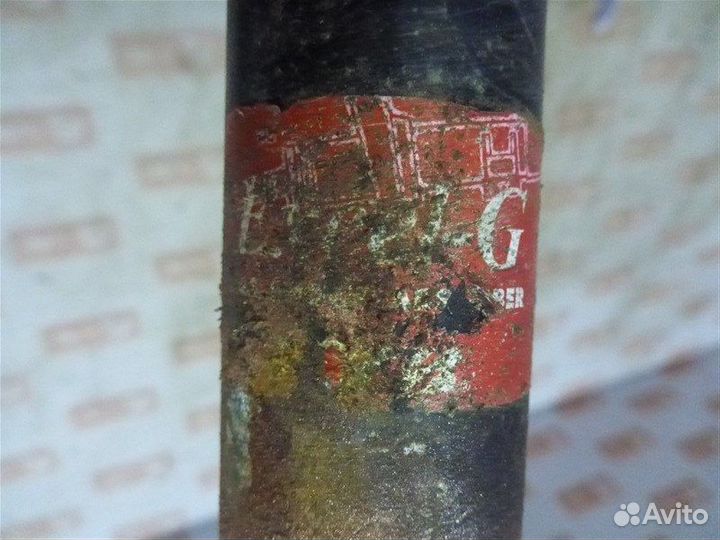 Амортизатор задний левый Nissan Almera Classic B10