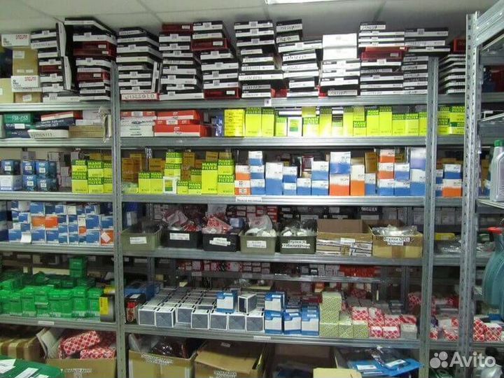 Амортизатор левый передний Carens 2 02