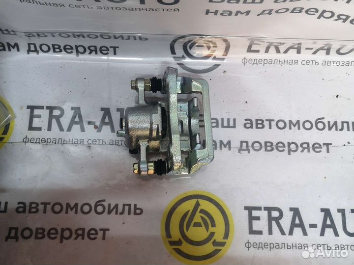 Суппорт тормозной hyundai tucson 04- зад.лев
