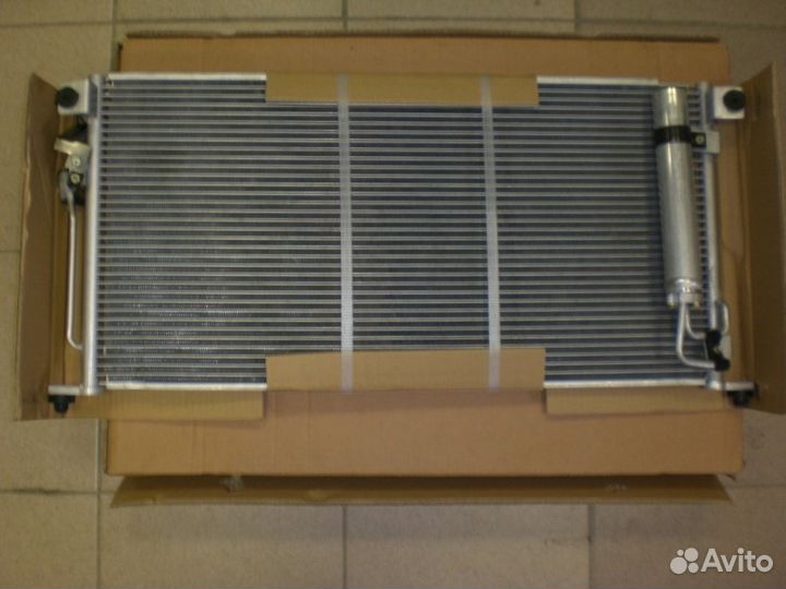 Радиатор Лансер 9. новый Lancer