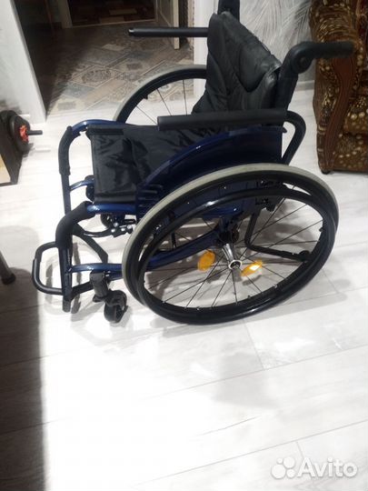 Инвалидная коляска